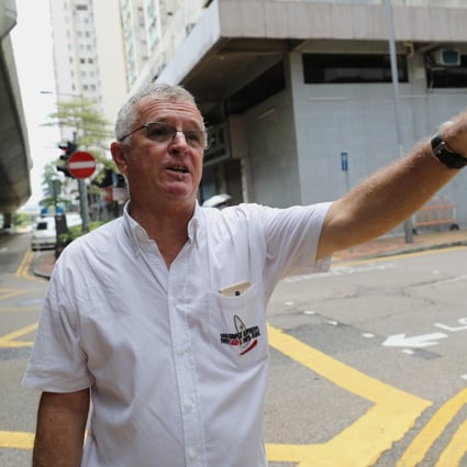 Jan Bochenski recalls his arrest in Sai Wan as he stood on the street. Photo: Edward Wong