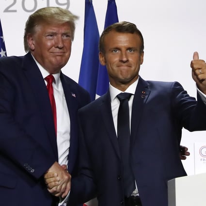 US President Donald Trump and French President Emmanuel Macron shake hands after their joint news conference at the Group of Seven summit meeting on Monday in Biarritz. Photo: AP