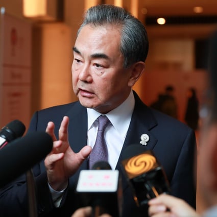 Chinese Foreign Minister Wang Yi calls on Hong Kong business leaders to become a unifying force as protests triggered by an extradition law enter their 12th week. Photo: Xinhua