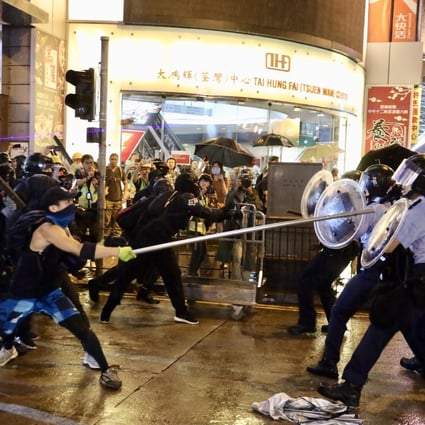 Protesters clash with police in Tsuen Wan. The volatile demonstrations in Hong Kong have damaged confidence in the city’s financial markets. Photo: Xinhua