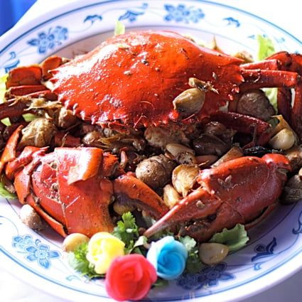 Garlic baked crab at New Ubin Seafood restaurant is just one traditional Singaporean dish that is still popular today.