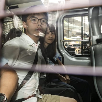 Joshua Wong and Agnes Chow were detained on a number of charges. Photo: Edmond So