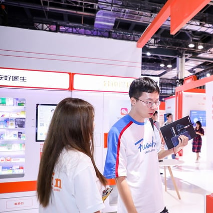 Visitors to the World Artificial Intelligence Conference in Shanghai checking out smart gadgets displayed by Ping An Good Doctor on August 29, 2019. Photo: SCMP/Handout