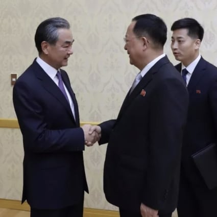 Chinese Foreign Minister Wang Yi (left) meets his North Korean counterpart Ri Yong-ho in Pyongyang. Photo: Handout