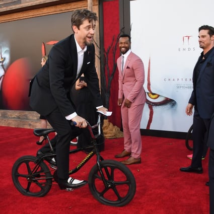 It Chapter Two director Andy Muschietti (on bike) has controversially claimed that King’s horrifying invention Pennywise shares a lot in common with President Donald Trump. Photo: Robyn Beck/AFP