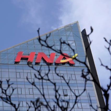 HNA Group’s logo on the building of HNA Plaza in Beijing on February 9, 2018. Photo: Reuters