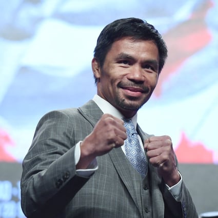 At Manny Pacquiao’s first major concert on Sunday, he sang songs from his own album which has sold thousands. Photo: AFP