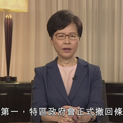 Carrie Lam speaks in the television message on Wednesday announcing that the government will formally withdraw an extradition bill and set up an IPCC inquiry into police actions during the protests. Photo: AP