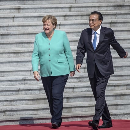 German Chancellor Angela Merkel and Chinese Premier Li Keqiang at the Great Hall of the People in Beijing on Friday. Photo: AP