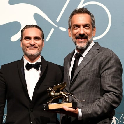 Director Todd Phillips (right) and Joaquin Phoenix with the Golden Lion for Best Film at the 76th Venice Film Festival. Photo: Reuters