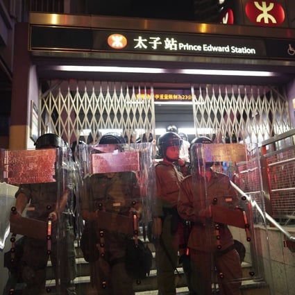 Police lock down Prince Edward MTR Station on August 31 after a clash with protesters that sparked online rumours that three people had died. Photo: AP