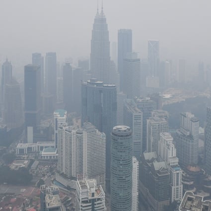 The Kuala Lumpur skyline, including the Petronas Twin Towers, is shrouded in haze on September 11, 2019. Photo: AFP