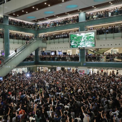 Protesters gather at New Town Plaza shopping mall in Sha Tin. Photo: Sam Tsang