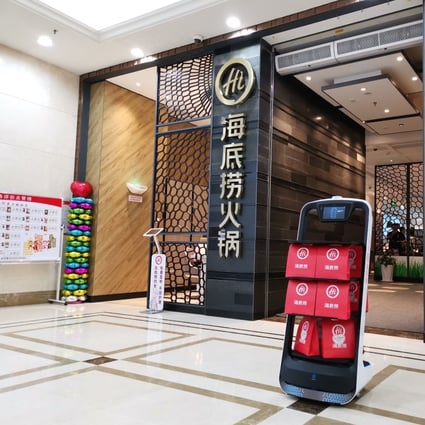 Catering robots developed by Pudu Tech, the three-year-old Shenzhen start-up, have been adopted by thousands of restaurants in China, as well as some foreign countries including Singapore, Korea, and Germany. Photo: Handout