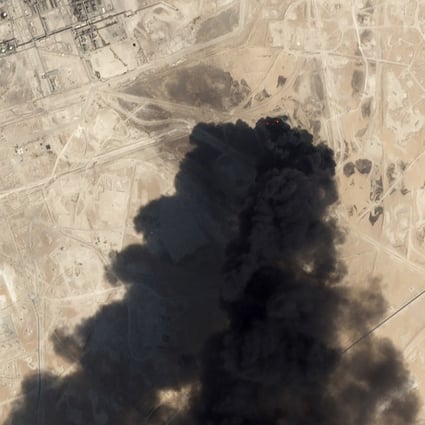 A satellite image from Planet Labs shows thick black smoke rising from Saudi Aramco's Abqaiq oil processing facility in Buqyaq, Saudi Arabia. Photo: AP