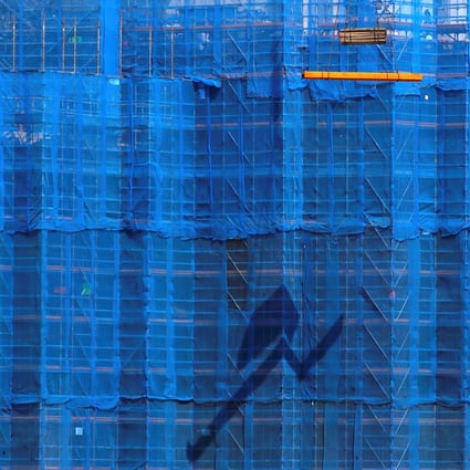 A construction site in central Sydney. The Reserve Bank of Australia, which delivered back-to-back rate cuts in June and July, has its work cut out given the official cash rate is already at an all-time low of 1 per cent. Photo: Reuters