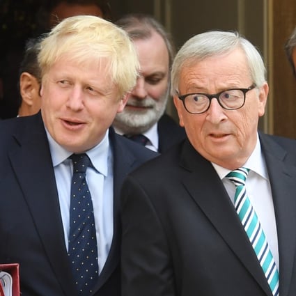 British Prime Minister Boris Johnson pictured with President of the European Commission Jean-Claude Juncker on Monday. Photo: DPA