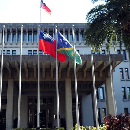 The flags of Taiwan (left) and the Solomon Islands outside Taiwan’s foreign ministry in Taipei. Photo: EPA-EFE