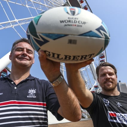 Hong Kong Rugby Union chief executive officer Robbie McRobbie and Hong Kong national team member Matthew Rosslee at the Hong Kong Observation Wheel in Central where the fanzone will take place. Photo: Tory Ho