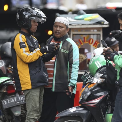 Indonesia is also working with Gojek and Grab to accelerate a safe and integrated transport system through a smart mobility program. Photo: AP
