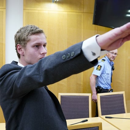 Norwegian suspect Philip Manshaus makes a Nazi salute as he appears at the Oslo District Court in August. Photo: EPA-EFE