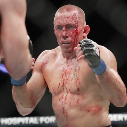 Georges St-Pierre taking on Michael Bisping at UFC 217 in November 2017. Photo: AP