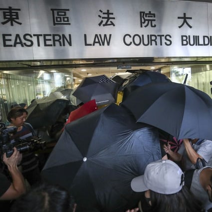 Supporters of the arrested protesters appear at Eastern Court in Sai Wan Ho. Photo: Winson Wong