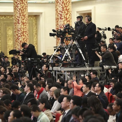Journalists working in Chinese state media will have to pass the exam to get a press card. Photo: Xinhua