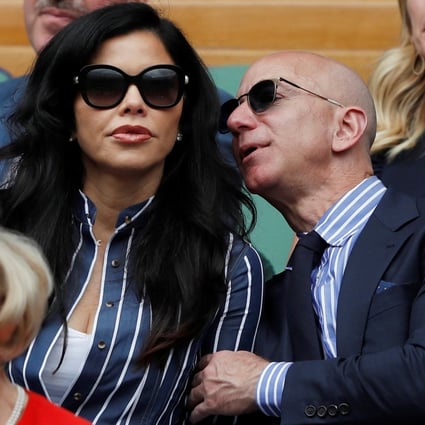 Jeff Bezos and Lauren Sanchez made their first public appearance following the billionaire’s divorce at the men's Wimbledon finals. Photo: Reuters