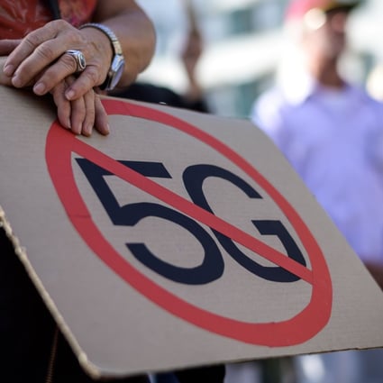 People take part in a national demonstration against 5G technology in Bern. Photo: AFP