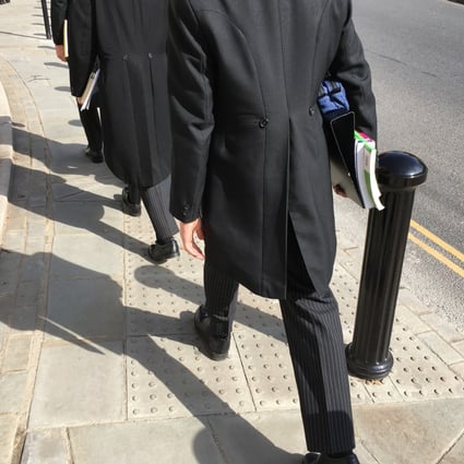 Eton schoolboys, dressed in their traditional uniform of tails, attend class. File photo: Shutterstock