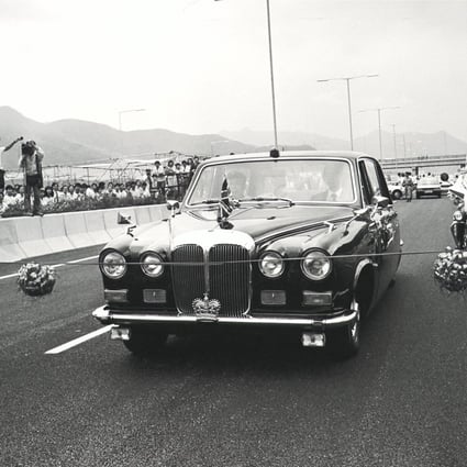 Governor Edward Youde’s car cuts a ribbon to open the Sha Tin to Fanling section of the New Territories Trunk Road on September 24, 1985.