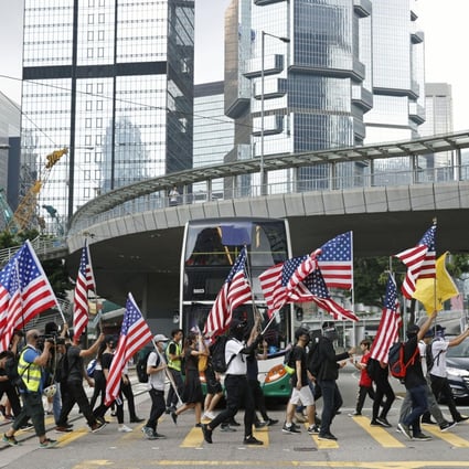 Demonstrators head to the US Consulate in Hong Kong on September 8, calling on American lawmakers to support democratic aspirations in the city. On Tuesday, a bill aimed at doing that passed the House and Senate. Photo: Kyodo