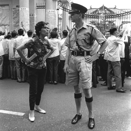 A Hong Kong policeman in khakhi drill at a protest outside Government House during the Black and white photo. Riot 1967 riots. Photo: SCMP