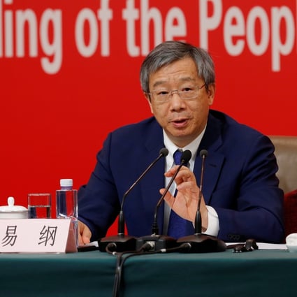 Governor of the People's Bank of China (PBOC) Yi Gang poured cold water on prospects of an imminent launch of Beijing’s own digital currency. Photo: REUTERS