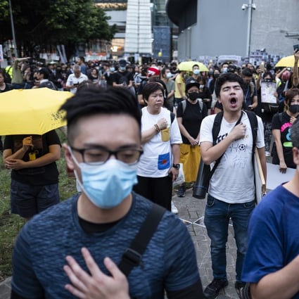Demonstrators singing the ‘Glory To Hong Kong protest anthem outside the government offices on September 28, 2019. Photo: Bloomberg