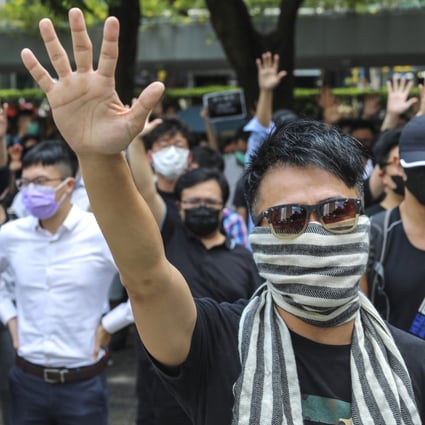 Protesters rally in Central against the new anti-mask law introduced by the Hong Kong government on Friday. Photo: Felix Wong