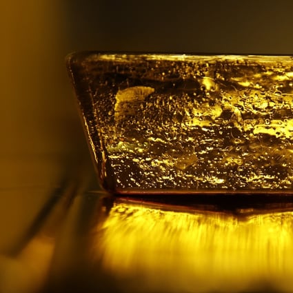 A gold bullion bar at a refinery in Switzerland. The price of the yellow metal has gained 23 per cent in the past 12 months as investors sought safety from global uncertainty. Photo: Bloomberg