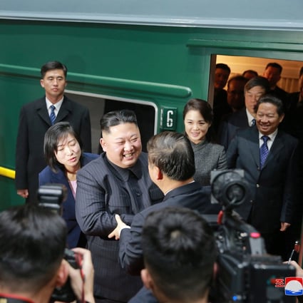 Kim Jong-un (centre) bids farewell to China’s International Liaison Department chief Song Tao in Dandong after a visit in January. Photo: KCNA/Korea News Service via AP