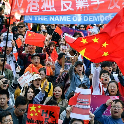 Ethnic Chinese activists march in a pro-China demonstration on the streets of Sydney in August. Photo: AFP