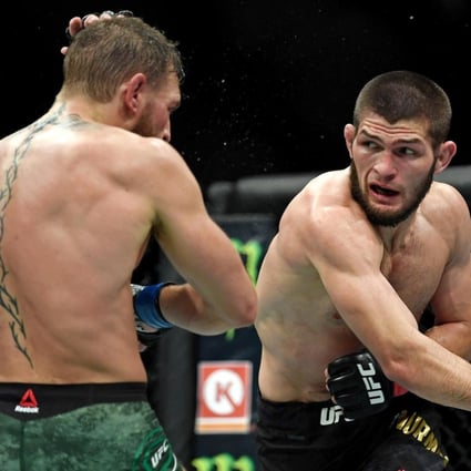 Russian mixed martial artist Khabib Nurmagomedov (right) heads for victory against Irish fighter Conor McGregor in their UFC lightweight contest in August 2018, but could they fight again in a charity bout? Photo: Reuters