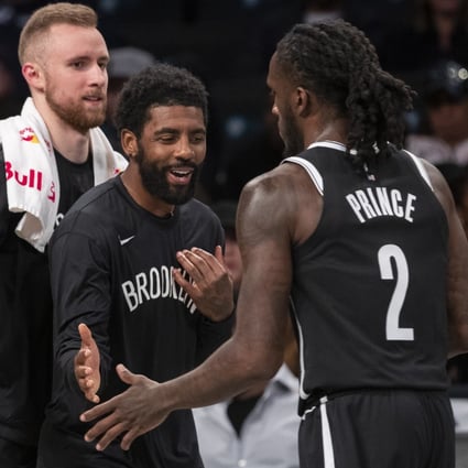 Brooklyn Nets’ players share a laugh during an exhibition game against at the Sesi/France club in Brazil over the weekend. Photo: AP