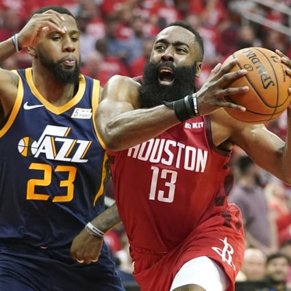 In this April 17, 2019, file photo, Houston Rockets guard James Harden (right) drives against Utah Jazz forward Royce O’Neale during a first-round NBA basketball playoff series in Houston. Photo: AP
