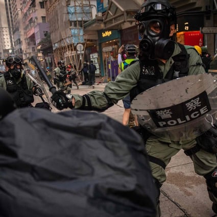 Hong Kong police and protesters clash on October 1. Photo: AFP