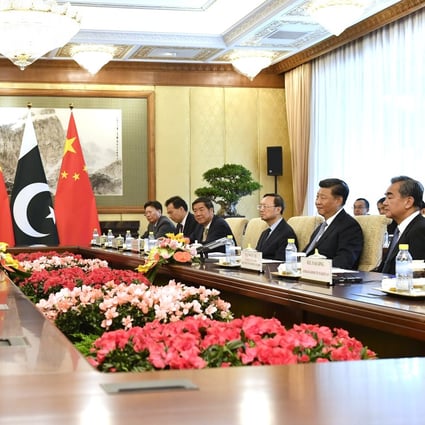 Pakistani Prime Minister Imran Khan (second from left) holds talks with Chinese President Xi Jinping (second from right) during their meeting at the Diaoyutai State Guesthouse in Beijing on Wednesday. Photo: EPA-EFE