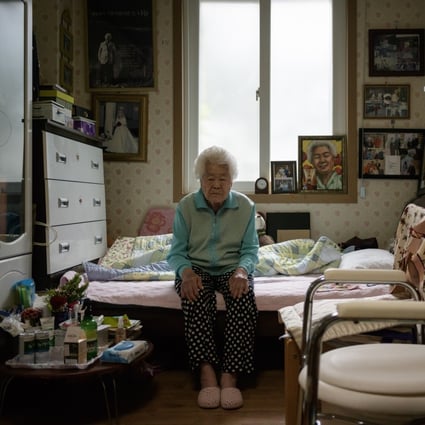 Lee Ok-sun in her bedroom at the Sharing House, a nursing home east of Seoul for South Korean former sex slaves of the Japanese army in World War II. Her life story is told in Grass, a graphic novel by Keum Suk Gendry-Kim. Photo: AFP