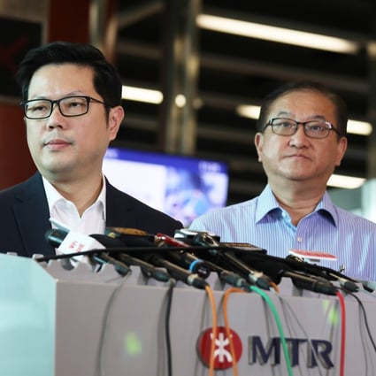 Sammy Wong (left), the MTR Corp’s chief of operations, and Alan Cheng, the general manager for special duties, on Friday at Tseung Kwan O MTR station. Photo: Xiaomei Chen