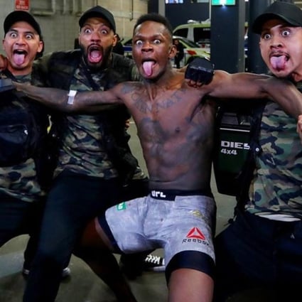 Israel Adesanya backstage with his friends after UFC 243. Photo: Twitter