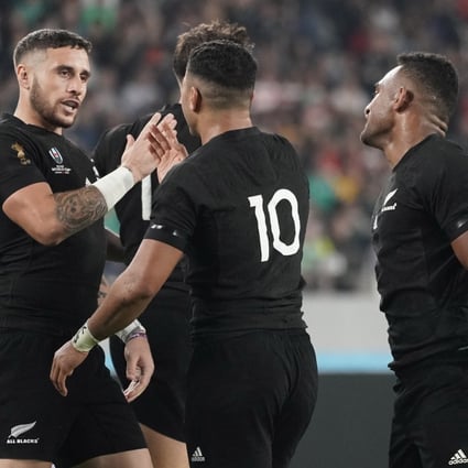 New Zealand’s Richie Mo’unga (centre) and Sevu Reece (right) celebrate scoring a try during their Rugby World Cup quarter-final win over Ireland. Photo: EPA