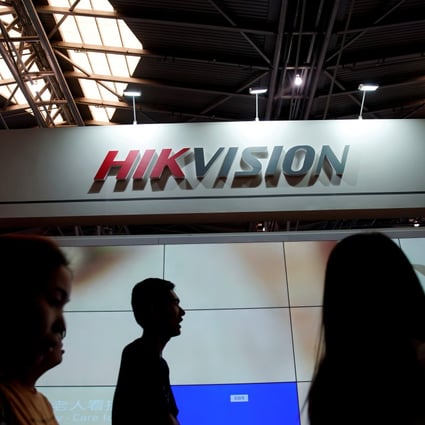 People visit a Hikvision booth at a security exhibition in Shanghai, China May 24, 2019. Photo: Reuters
